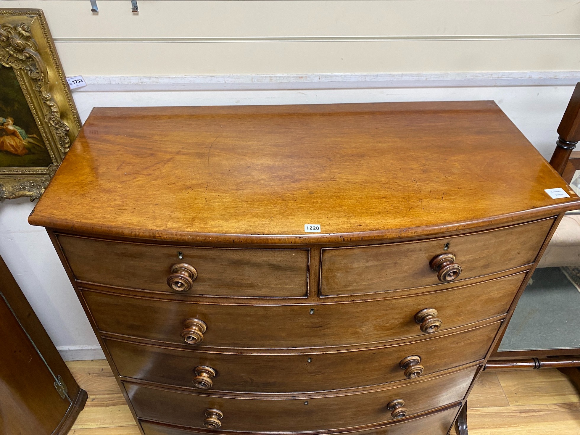 A Victorian mahogany bow fronted chest of two short and four long drawers, width 115cm, depth 55cm, height 127cm